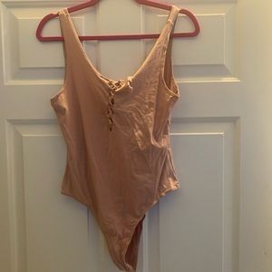 Large mauve body suit